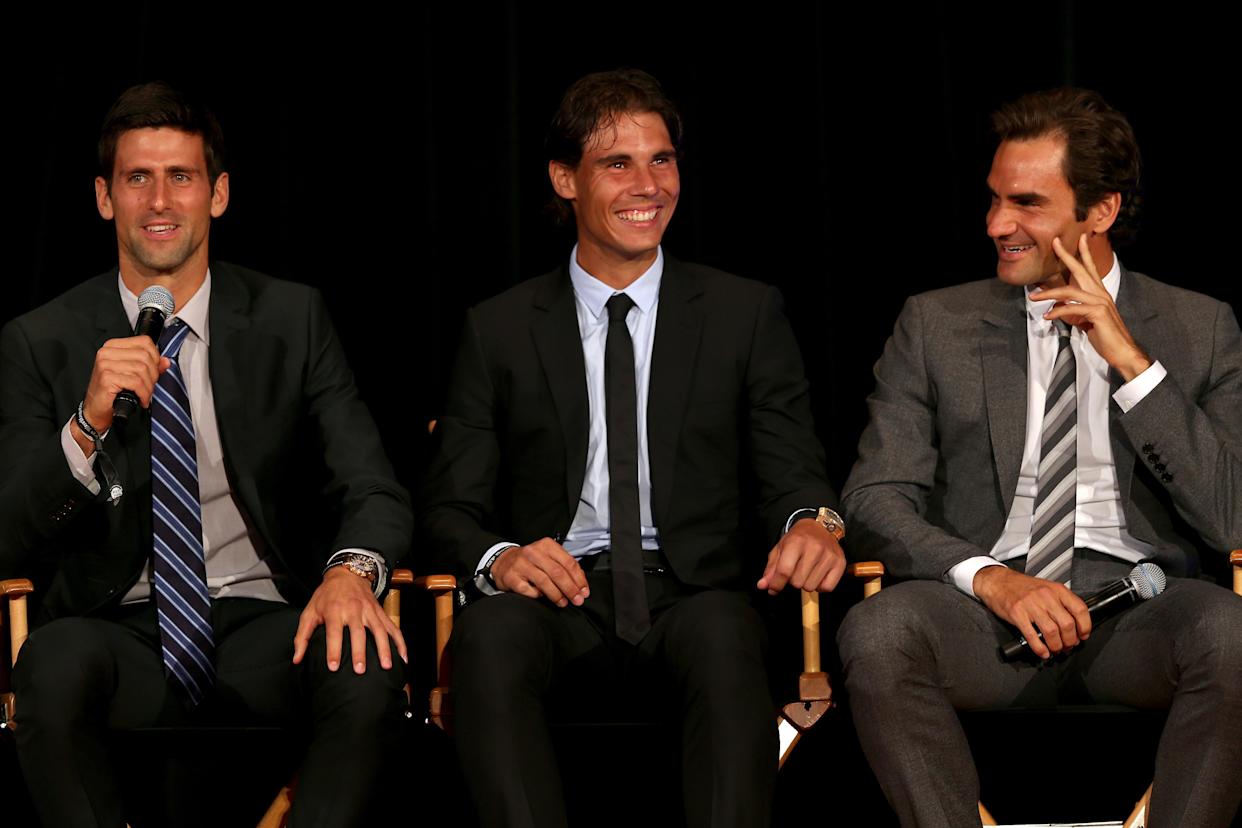 Gwiazdy tenisa Novak Djokovic z Serbii, Rafael Nadal z Hiszpanii i Roger Federer ze Szwajcarii na scenie podczas ATP Heritage Celebration 23 sierpnia 2013 r. (Matthew Stockman/Getty Images)