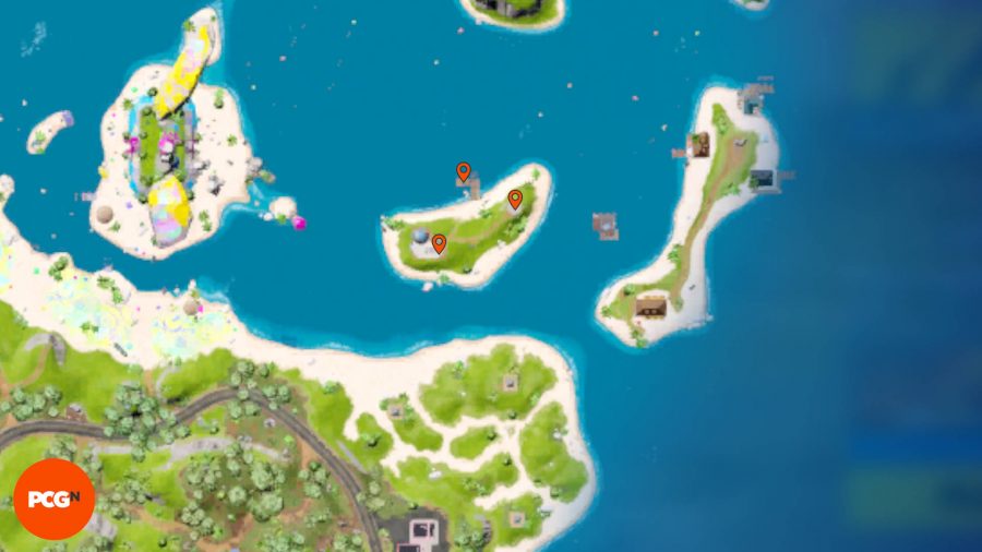 Lokalizacje żetonów Fortnite Tover: trzy pomarańczowe pinezki pokazujące lokalizacje żetonów Tover na wyspie na północ od Jonesów.