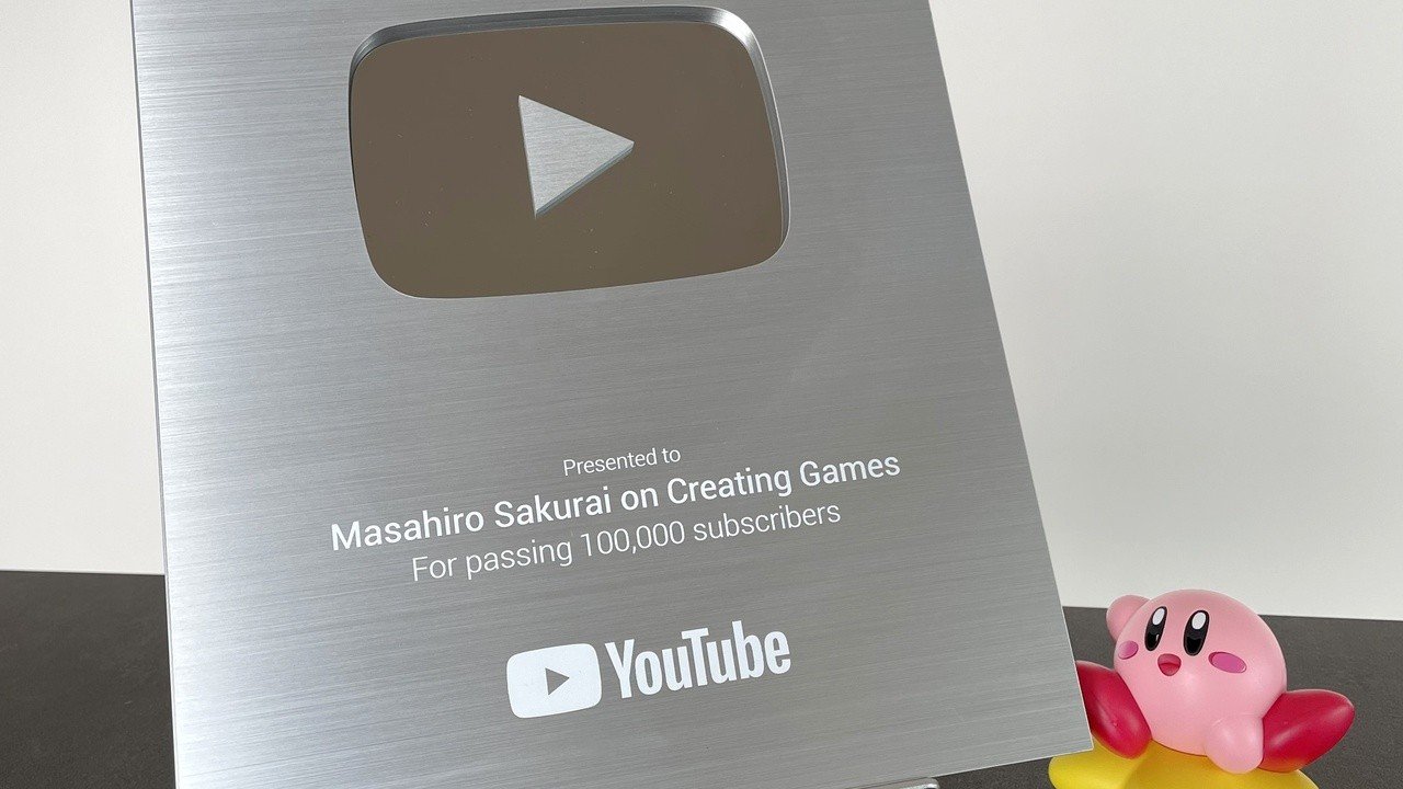 Losowo: Masahiro Sakurai pokazuje swój srebrny przycisk odtwarzania YouTube