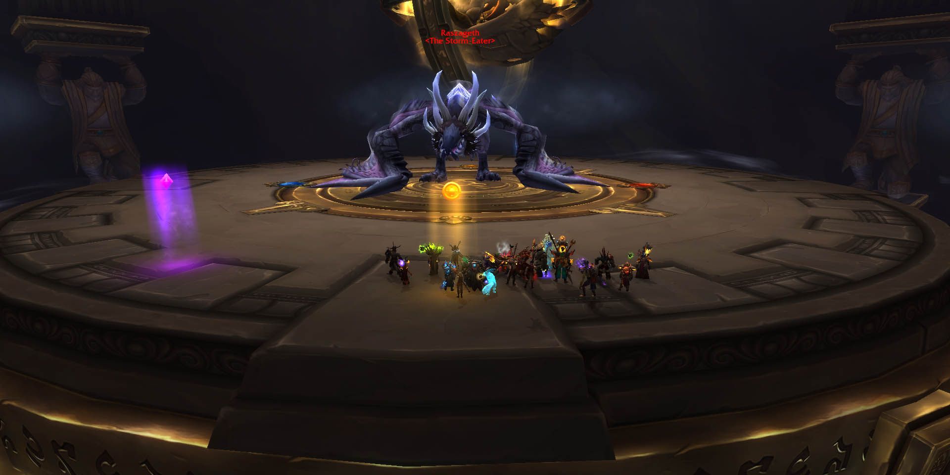 World of Warcraft - zespół rajdowy walczący z wielkim niebieskim smokiem