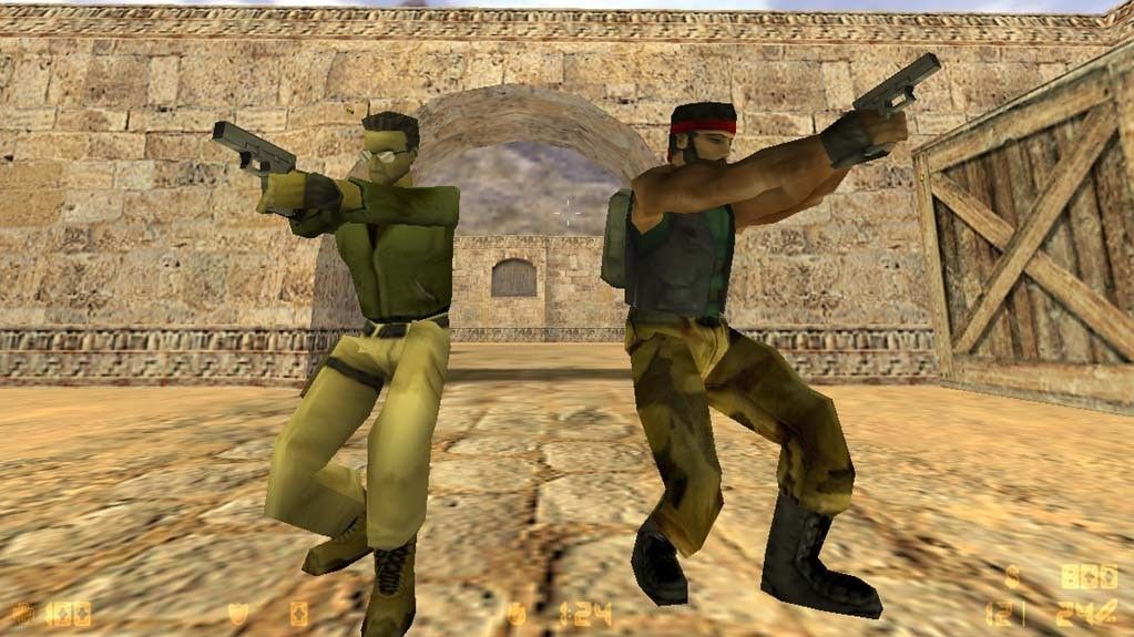 Two players posing with their guns in the original Counter-Strike.