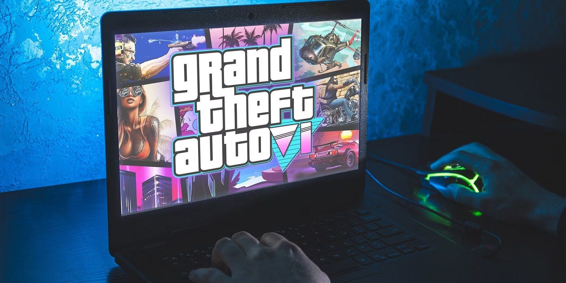 Zdjęcie laptopa z obrazem w stylu Grand Theft Auto 6 na ekranie.