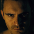 Villain looking into the camera