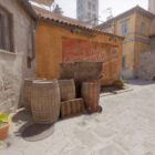 A selection of barrels and plywood at the top of Banana on Inferno in CS2.