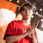 TenZ looking at the camera with hands together
