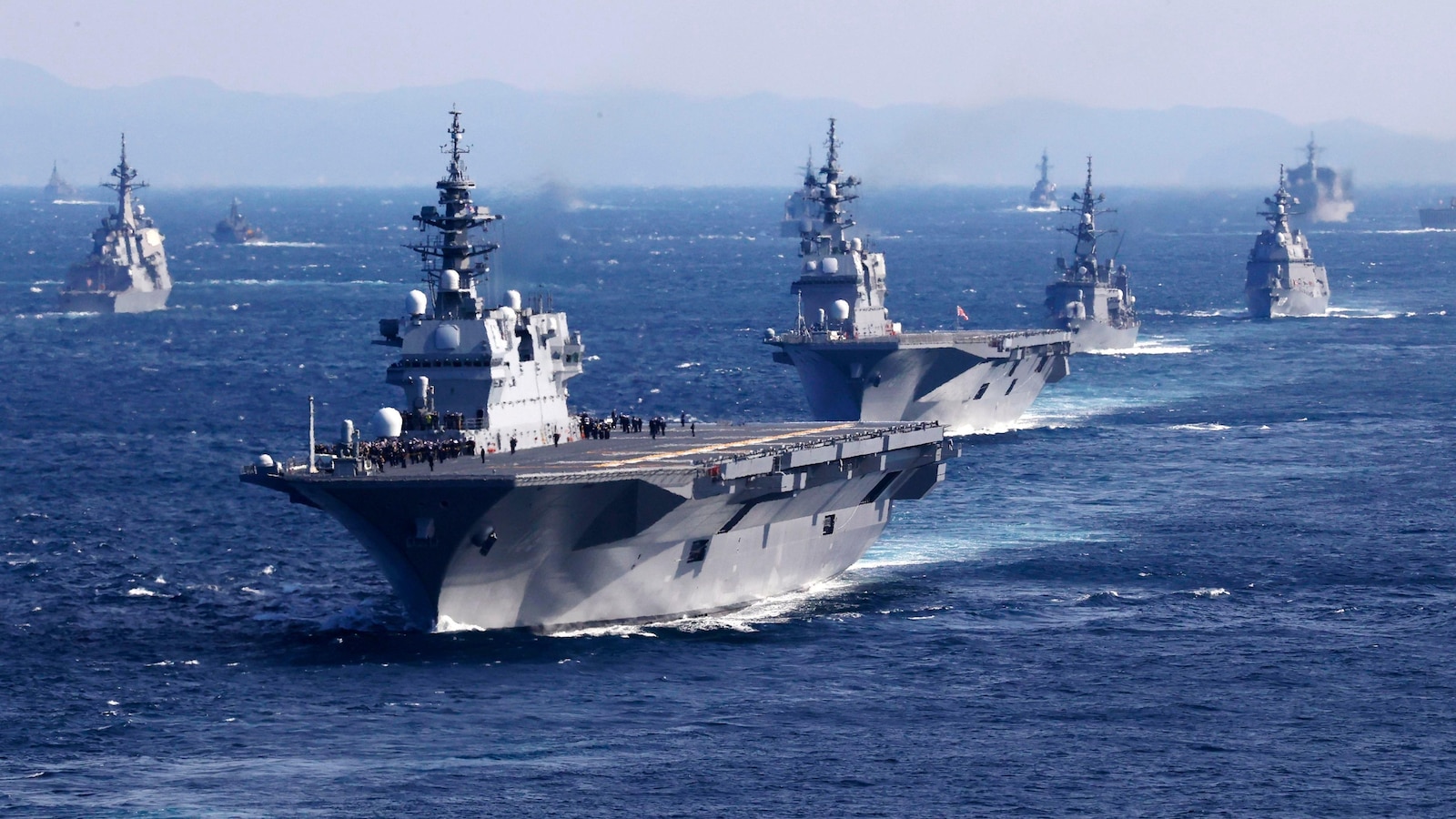 Japan defense chief urges higher security after drone video of warship posted on China social media