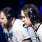 Donk, a CS2 player, sits and plays with his Team Spirit teammates at IEM Katowice 2024.