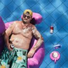 GTA 6 Cal Hampton in a pool on a pink flamingo float